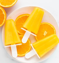 ORANGE ICE LOLLIES ( FACTORY - MADE ) FORMULATIONS AND PRODUCTION PROCESS